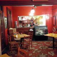 Dining area with serving counter in the back at Bhava in New Orleans