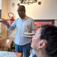 The owner came to our table to make sure everything was to our liking .  at Delhi Indian Restaurant in Catania