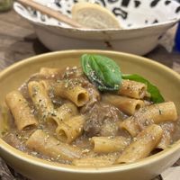 Seitan with pasta  at Pan y Circo in Sevilla