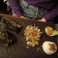 Tofu and tempeh in coconut milk and banana leaf at Cinta Rasa in Turin