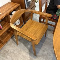 Custom made teak chair  at Kamkinsuk Northern Thai Food in Bangkok