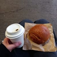 Coconut latte and pain au chocolat at Noch Coffee Co in Dundee
