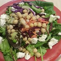 Salad with chickpeas, veggies and tofu. They sometimes have a asian ginger soup station with tofu so I got tofu from there. at Sweet Tomatoes in Naples