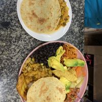 Vegan Casado (bottom) torilla de papas (top)  at Soda San Cristobal in San Jose
