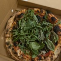 (Unfortunately blurry) photo of the vegan queen pizza at Mama Pizza Kuta Lombok in Kuta