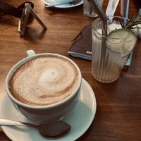 Cappuccino with oat milk and housemade lemonade   at Cafe Hibiskus in Cologne