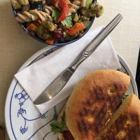 Tempeh Cashewkeese Panini mit kleinem Salat  at Cafe Rotkehlchen - Venloer Str in Cologne