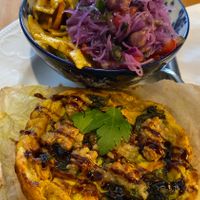 Quiche with carrot 'salmon' and two salads- pasta and potato.  at Cafe Rotkehlchen - Venloer Str in Cologne