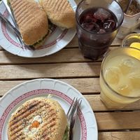 Vegan caprese panini and vegan carrot salmon bagel. Both delicious!  at Cafe Rotkehlchen - Venloer Str in Cologne
