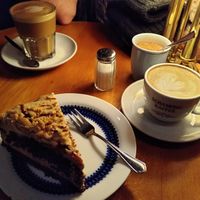 Peanut cake and a cappuccino with oatmilk at Cafe Rotkehlchen - Venloer Str in Cologne