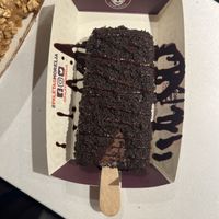 Chocolate hazelnut cookies and cream paleta dipped in dark chocolate 100% topped with Oreo cookies. Chocolate heaven!   at Morelia Gourmet Paletas   in Huntersville