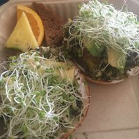 The Ghandi, vegan tofu scramble with added avocado on an everything bagel.  at Evolution Bakery and Cafe in Kailua Kona
