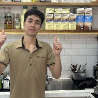 Friendly owner Dan Tit   at Tit Coffee  in Cat Ba