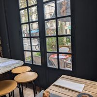 Moderately busy street at Café Moco in Paris