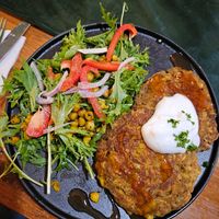 Homemade curried corn and chickpea fritters. Salad had roasted chickpeas. Coconut yogurt at Blackball's Inn and 08 Cafe in Blackball