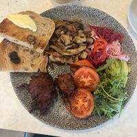 Vegan breakfast served with sourdough bread   at The Groundworks in Hitchin