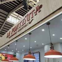 The sign  at La Porteñita Comidas Para Llevar in Valencia