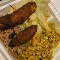 curry tempeh and a BIG plantain  at Reggae Shack Cafe in Gainesville