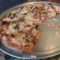 Vegan chz, mushrooms, garlic, and spinach  at Gaines Street Pies in Tallahassee