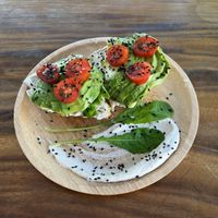 Avocado on sourdough with cashew cream cheesee  at The butterfly effect. in Chiang Mai