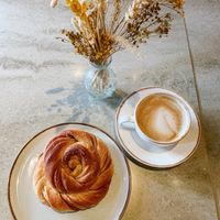 Cinnamon Bun and oat cappuccino   at Godt Brød - Dronningens Gate in Trondheim