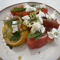 Watermelon and Heirloom tomato salad with vegan feta   at Drake Devonshire Inn  in Wellington