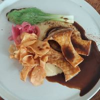 Eryngui, mousselini, glace de cogumelos e bok choy at Tau Cozinha in Sao Paulo