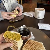 Chana masala wrap, oat milk hot chocolate   at Remedy Cafe - Jasper Ave in Edmonton