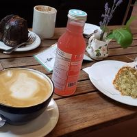 Soy latte, Kombucha and Vegan coconut lemon cake at Darwin's Cafe - temporarily closed in Tofino