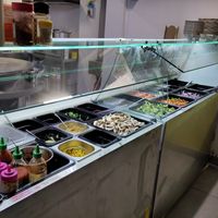 Whole buffet of fresh vegetables at Mongolian BBQ in Barcelona