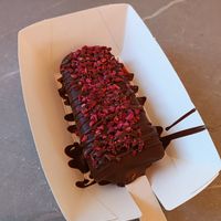 Salty caramel and dark chocolate, dipped in dark chocolate and lyophilized raspberry (way too sweet for us, but tasty) at Anjuna Ice Pops in Budapest