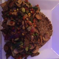 Tacu Tacu con especial vegano
(Peruvian style mixed beans and rice with mixed vegetables, soy meat and mushrooms) at Aji Limon in Cape Coral