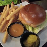 Vegan chicken sandwich with spicy sauce on side at Bullfinch Brewpub  in Syracuse
