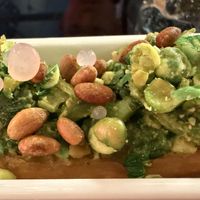 Salted mustard green with almond watercress pesto, ginger pearls and toasted pine nuts on Chinese donut  at Shu in Collingwood