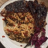 Yummy nasi goreng with smoky rice paper 'bacon' and a side of fresh red cabbage at Veganarchy in Antwerpen