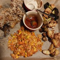 Tofu in panco crust, rice with vegetables, roasted eggplant  at KOOKPLANT in Drongen