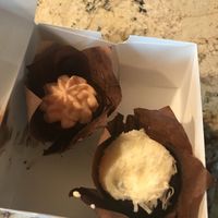 Coconut chocolate & strawberry vanilla cupcakes made in store ♥️ at Healthy Living Market in Saratoga Springs