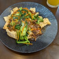 fried noodles with mixed vegetables and mushroom sauce at Anhly vegan in Sapa