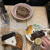 Everyone else’s desserts: carrot cake, brownie, and banana coffee cake?!? (Don’t remember the standalone)  at Vegan Food Tour in Paris
