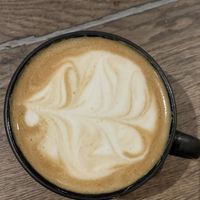 Cappuccino with pea milk  at Top Notch Bakery in Vaxjo