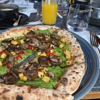 Vegan tofu pizza with a spinach base and mushrooms at Isabelle's in Dublin