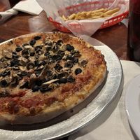 10-inch pizza with vegan cheese, mushrooms, and black olives; French fries   at UnCommon Pizza in Lititz