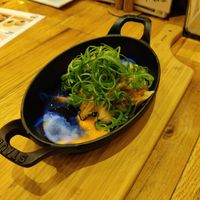 Burning onion dumplings at Isogami Gyoza Bar Tomako in Kobe
