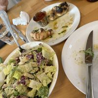 Garlic knots and cesear salad. Garlic knots were especially good.  at Via Tevere Main Street in Vancouver
