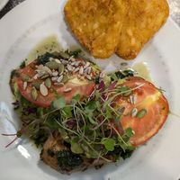 Smashed avocado on toast with a side of hash browns at Percy Thrower's Garden Centre in Shrewsbury