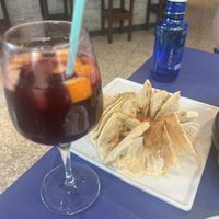 Sangria + hummus and pita breadd  at Reina Mónica in Granada