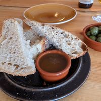 Sourdough bread, olive oil, olives at Nästgårds Bua in Ostersund