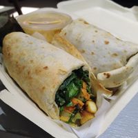 Chickpea wrap, peanut butter sauce in small jar. at The Planters in Ao Nang