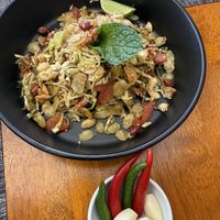Tea leaf salad (not certain  what to do with the raw garlic and peppers served on the side)   at The Planters in Ao Nang