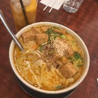 Laksa and peach iced teaa  at Au Lac Royal Vegan Cuisine in Dickson
